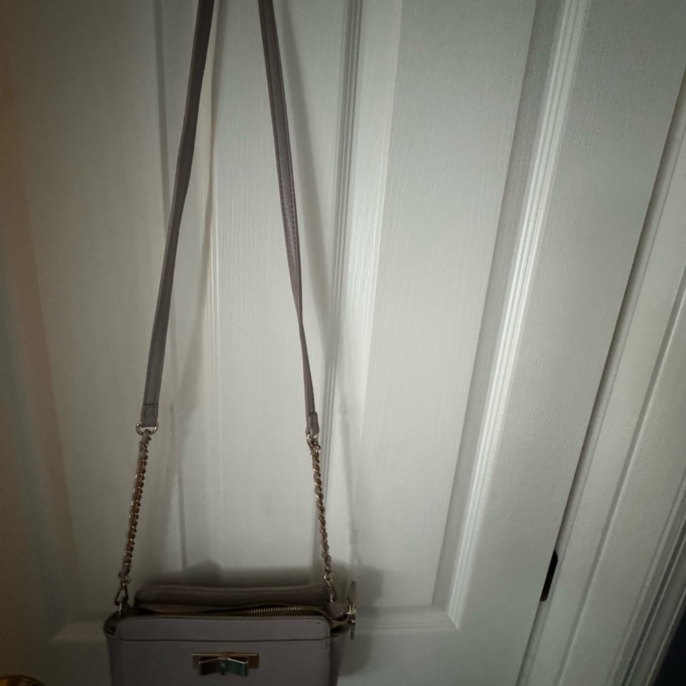 Light Pink Crossbody Bag with Gold Bow Accent